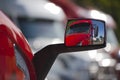 Reflection of the red truck in modern style mirror Royalty Free Stock Photo