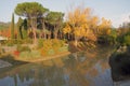 Reflection in river of colorful trees in fall Royalty Free Stock Photo