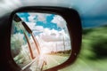 Reflection of the road in the mirror of the car Royalty Free Stock Photo