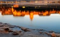 Reflection of the Royal Palace at sunset in the icy Danube River Royalty Free Stock Photo