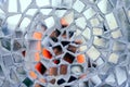 Reflection of the setting sun in the mirror pieces of glass mosaic - abstract background - shallow depth of field