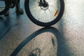 The reflection and shadow of a Bicycle wheel, bike on wet roads