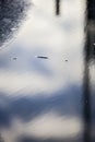 Reflection of sky and clouds in puddle Royalty Free Stock Photo