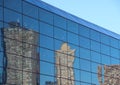 Reflection of Skyscraper in Blue Window Facade