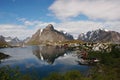 reflection of the snowed mountains in the sea water, Norwegian fjord, Leknes, Norway Royalty Free Stock Photo