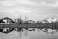 Reflection of a spring or autumn landscape in a city lake Royalty Free Stock Photo