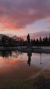 Reflection of statue on sunset