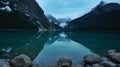 Reflection on the still water of Lake Louise Royalty Free Stock Photo