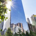 Reflection of the Sun and the New York skyscrapers in the Windows of Four World Trade Center in New York, USA Royalty Free Stock Photo