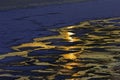 Reflection of the sun in the winter twilight of the ice Royalty Free Stock Photo