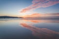 Reflection sunrise or sunset view with orange cloud and blue sky Royalty Free Stock Photo