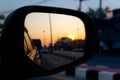 Reflection of the sunset in the car of side mirror view in Thailand. Royalty Free Stock Photo