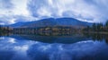 Reflection of sunset clouds in a lake in the Khibiny mountains Royalty Free Stock Photo