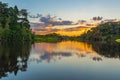 Sunset Reflection in the Amazon Rainforest Royalty Free Stock Photo