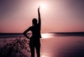 Reflection of a sunset by a lagoon inside the Amazon Rainforest Basin. The Amazon river basin comprises the countries of Royalty Free Stock Photo