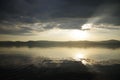 Reflection of sunset in a lake in the mountains Royalty Free Stock Photo