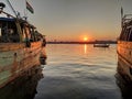 Reflection of Sunset over boat at N4 beach kasimedu chennai