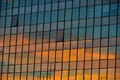 Reflection of sunset sky on the building windows Royalty Free Stock Photo