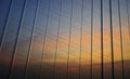 Reflection of sunset sky in metal wall of office Royalty Free Stock Photo