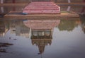 Reflection of the temple tower in the temple tank which stores water Royalty Free Stock Photo