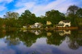 Reflection of three lake houses