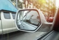 Reflection of a traffic jam in a sideview mirror, look in the rear view mirror of a car Royalty Free Stock Photo