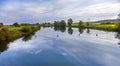 Reflection of trees in river tauber Royalty Free Stock Photo