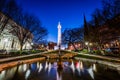 Reflection of the washington Monument from the pond in Mount Vernon Baltimore, Maryland at night Royalty Free Stock Photo