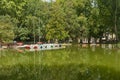 Reflection in the water of boats in the park D. Carlos I, in Caldas da Rainha, Portugal