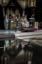 Reflection on water of Chinese god statues on Chinese altar table at Phutthamonthon sathan Royalty Free Stock Photo
