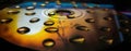 Reflection of water drops on a disk, close up, colourful , wallpaper Royalty Free Stock Photo