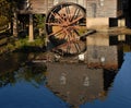 Reflection in the water of an old Grist Mill Royalty Free Stock Photo