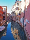 Reflections in a canal in the city of Venice, Italy Royalty Free Stock Photo