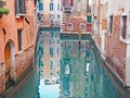 Reflections in a canal in the city of Venice, Italy Royalty Free Stock Photo