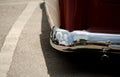 Reflections in chrome details of of exterior of a classic car -