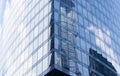 Reflections of clouds in windows of a skyscraper