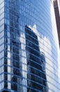 Reflections of clouds in windows of a skyscraper Royalty Free Stock Photo