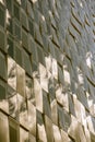 Reflections of cloudy sky on a glass facade, sepia effect Royalty Free Stock Photo