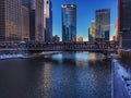 Reflections of downtown Chicago Loop on the river water in morning during winter. Royalty Free Stock Photo