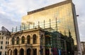 Reflections of early morning sky in the windows of Novotel Hotel in old town of Bucharest, Romania, 2020