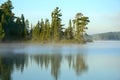 Reflections on a Foggy Wilderness Lake Royalty Free Stock Photo