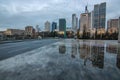 Reflections in Frankfurt am Main. Great reflection in puddles. The city, skyscrapers and streets are reflected in the water