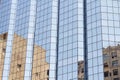 Reflections on a glass building in the city Royalty Free Stock Photo