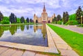 Reflections of main building of famous Russian university in fountain cascade pool under dramatic clouds Royalty Free Stock Photo