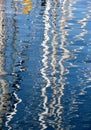 Reflections of the masts of some sailboats Royalty Free Stock Photo