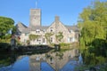 Reflections of Mill Pond cottages and St Mary`s Church in Church Hill, Swanage Royalty Free Stock Photo