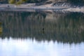 A lone fisherman works the Missouri River.