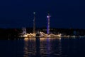 Reflections at night of the amusement park GrÃ¶na Lund, Stockholm, Sweden