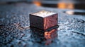 Reflections of the Night: An Intriguing Encounter with a Reflective Metallic Cube on Rain-Soaked Asphalt