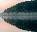 Reflections of the pines in the boundary waters of Minnesota